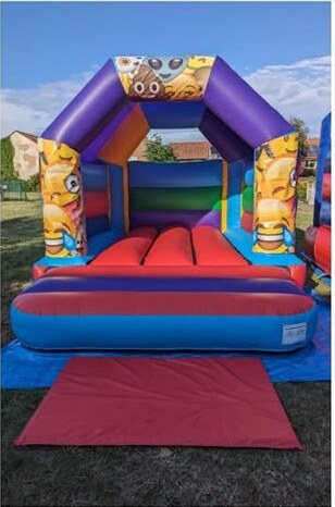 Emoji themed open-front bouncy castle