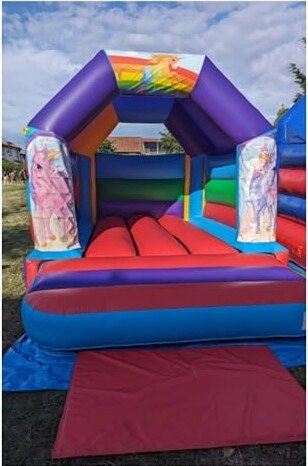 Unicorn and rainbow open-front bouncy castle
